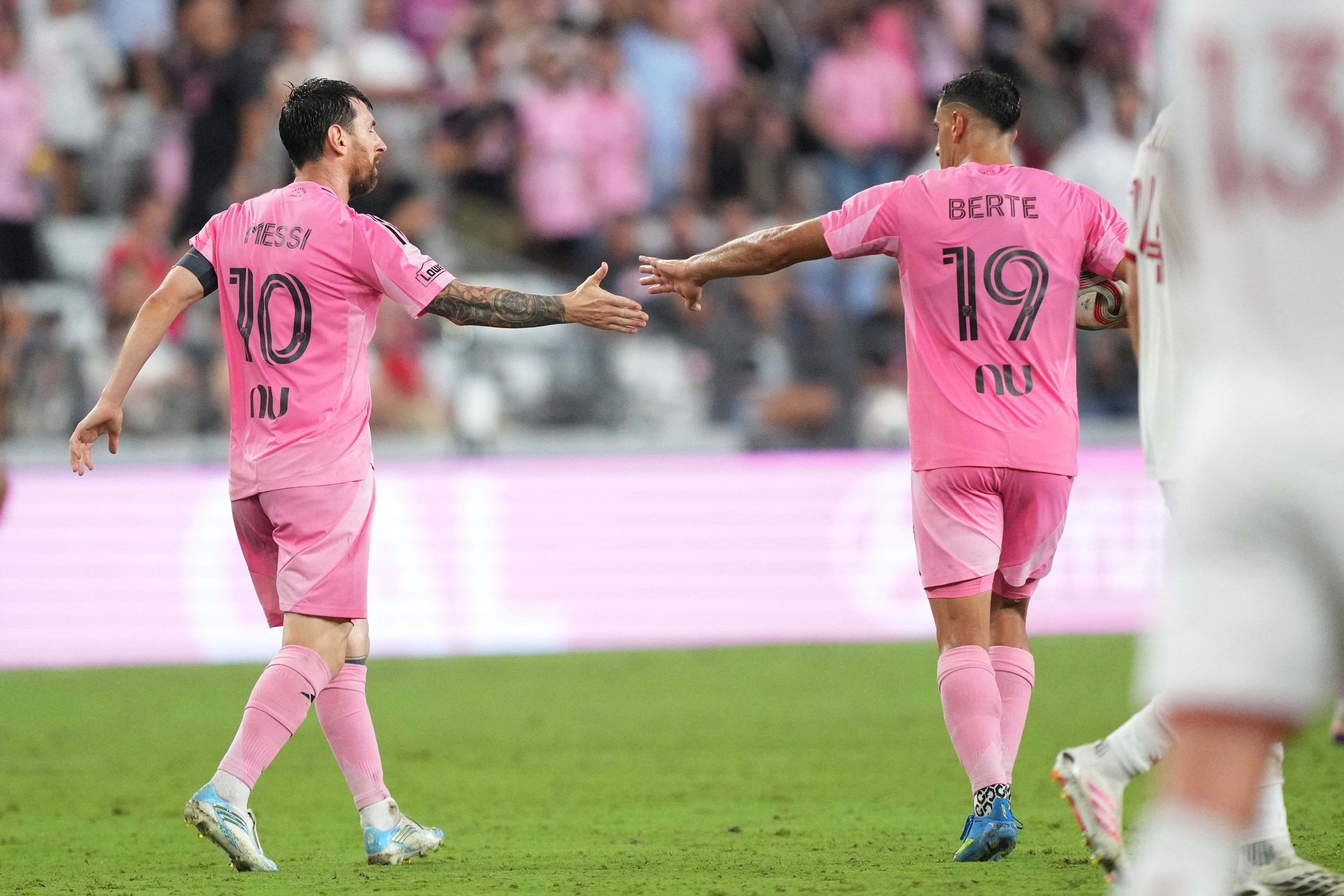 Aug 22, 2026; Miami, Florida, USA;  Inter Miami forward Lionel Messi (10) celebrates a goal with German Berterame (19) against Toronto FC during the second half at Miami Freedom Park.  Mandatory Credit: Jim Rassol-Imagn Images